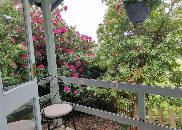 Chalé Treeside Woodhouse