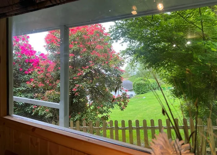 Treeside Woodhouse Chalé *